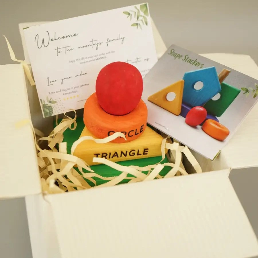 Box in rainbow wooden shape toys